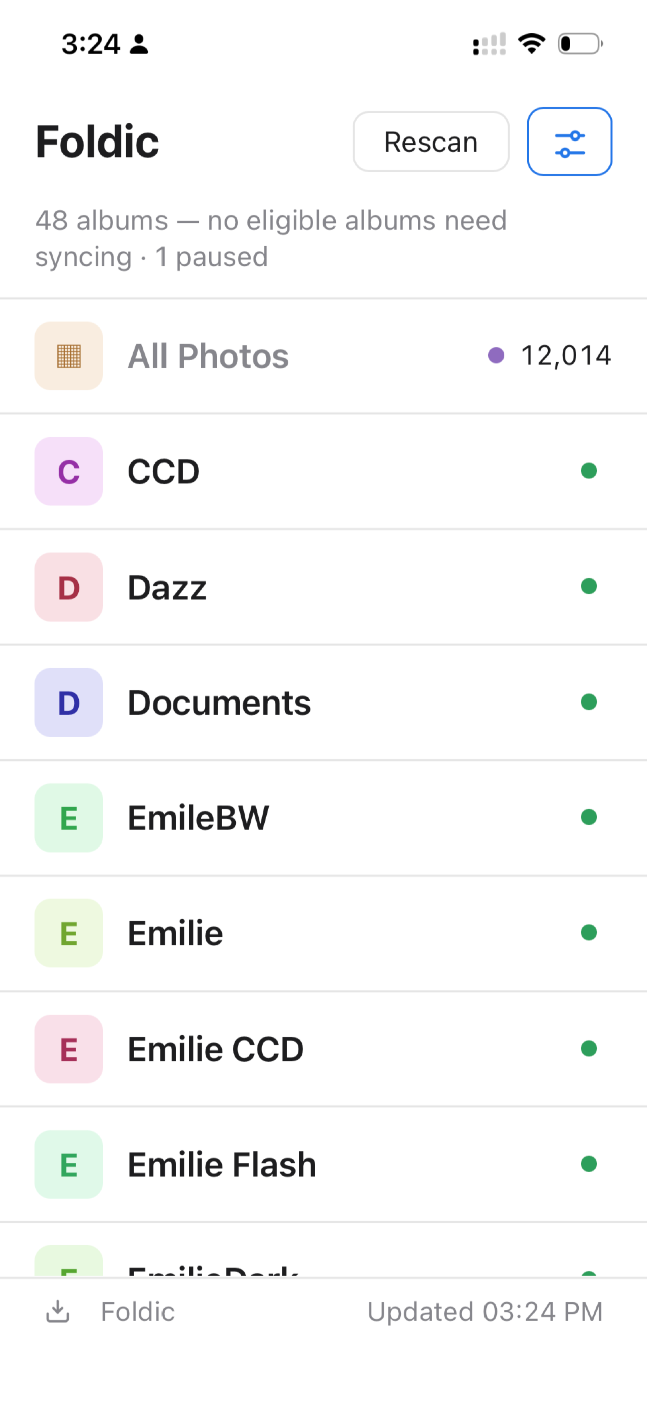 Foldic on iPhone showing albums being copied to an attached drive